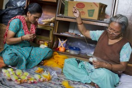 Indian women crafting the angels
